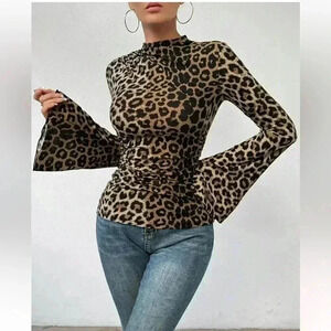 Size XL leopard silky long sleeve funnel neck blouse. Great details! NWOT